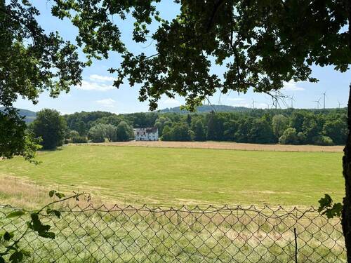 Fernblick vom Grundstück - Einfamilienhaus mit 152,20 m² in Wied zum Kaufen