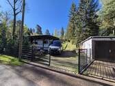 Einfahrt mit Carport - Bungalow mit 110,00 m&sup2; in Bad Schmiedeberg zum Kaufen