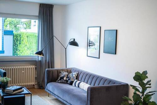 Wohnzimmer mit Garten-Blick - 3 Zimmer Etagenwohnung in Bonn