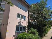 Hausansicht - großzügige 4 Zimmer Wohnung im EG mit Balkon, TG-Stellplatz und Aufzug in Wertheim Hofgarten (Besichtigungstermin beachten!)