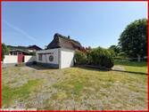 Zufahrt mit Garage und separatem Zugang zur geschützten Westterrasse - Einfamilienhaus mit 105,40 m&sup2; in Taarstedt / Westerakeby zum Kaufen