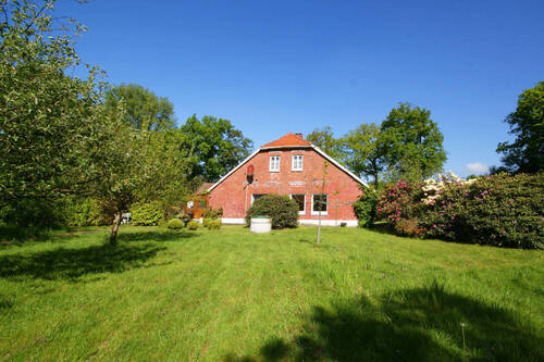 Rückansicht Garten - 7 Zimmer Mehrfamilienhaus, Wohnhaus in Westerstede
