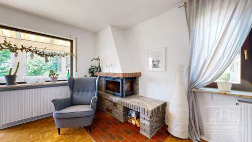 OG - Wohnzimmer mit Holzofen - 