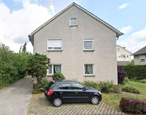 Aussen - Dreizimmerwohnung mit Dachgeschoss und Garten