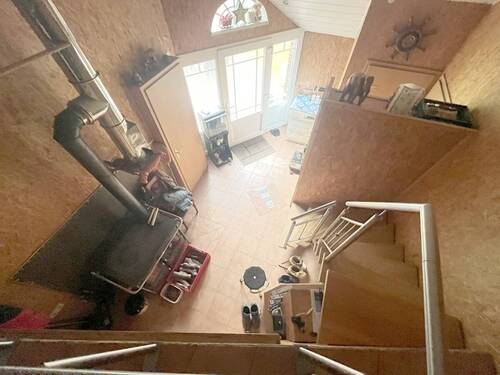 Blick in die Diele mit Stangenofen - 