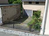 Einfahrt zur Garage / Innenhof - 