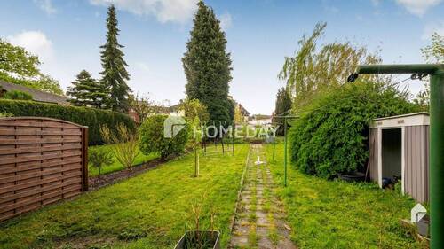 Außenansicht 6 - Voll vermietetes Mehrfamilienhaus mit Garten - Ihre Chance auf stabile Mieteinnahmen