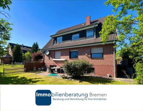 Immobilienberatung Bremen - Zweifamilienhaus inkl. drei Garagen in Sudweyhe