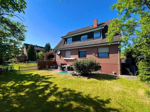 Rückansicht - 8 Zimmer Mehrfamilienhaus, Wohnhaus zum Kaufen in Weyhe