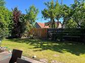 Blick Garten - Mehrfamilienhaus, Wohnhaus mit 180,00 m² in Weyhe zum Kaufen