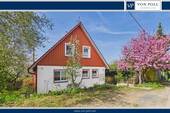 Titelbild - BIETERVERFAHREN: Idyllisches Einfamilienhaus mit blickgeschütztem Garten