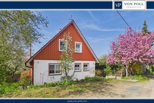 Titelbild - BIETERVERFAHREN: Idyllisches Einfamilienhaus mit blickgeschütztem Garten
