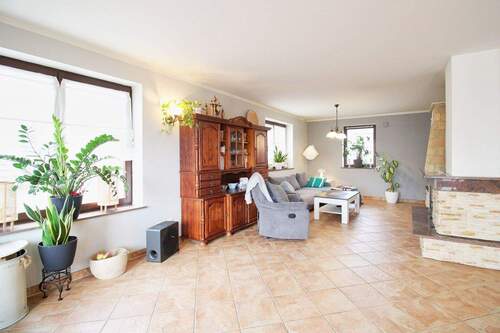Wohnbereich mit Kamin - 4 Zimmer Einfamilienhaus zum Kaufen in Ribnitz-Damgarten / Petersdorf