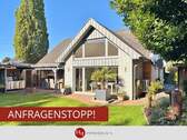 Haus zu verkaufen in Stuhr Varrel – H & T Immobilien - Helles Haus in Stuhr-Varrel mit offenem Giebel, Kamin & Garten!