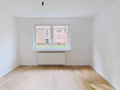 Ansicht I: Wohn- und Esszimmer - Ruhig aber modern: Lichtdurchflutete 2-Zimmer-Erdgeschosswohnung mit gemütlichem Ambiente