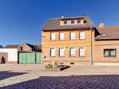 36_1.jpg - vermietetes Mehrfamilienhaus mit Nebengelass
