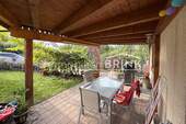 Überdachte Terrasse und Garten - 