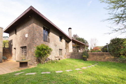 Gartenansicht - Großzügiger Bungalow in bevorzugter Lage mit unverbautem Blick