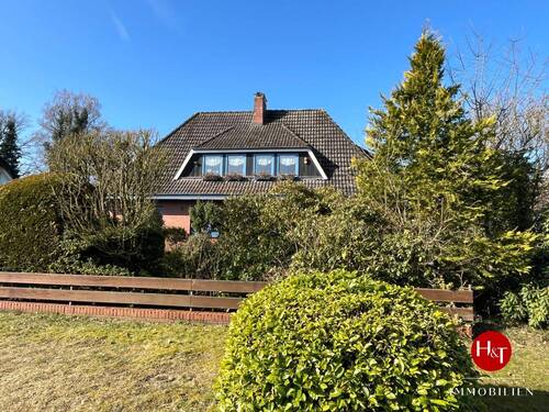 Haus Verkauf Kirchseelte - H&T Immobilien - Familienidyll im Grünen - Wohnhaus mit gemütlicher Einliegerwohnung