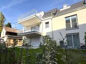 Gartenansicht - Bezugsfertige 4-ZKBB Neubauwohnung mit Lift im 1. OG