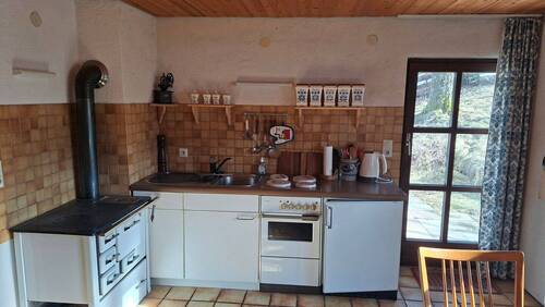Küche mit Zugang zur Terrasse - 