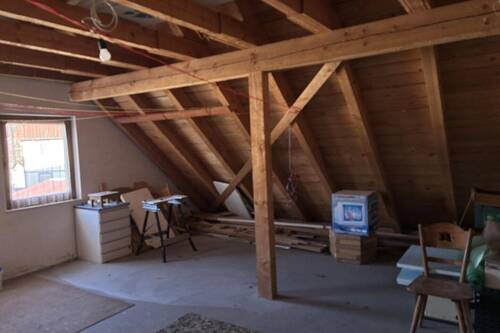Walmdach über Garage als zusätzlichen Stauraum - 
