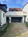 Ansicht Garage - 7 Zimmer Einfamilienhaus zum Kaufen in Stegaurach