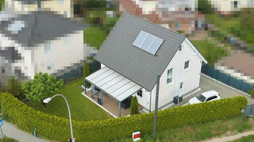 Luftaufnahme - Charmantes Einfamilienhaus mit hochwertiger Ausbaustufe in begehrter Lage