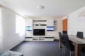 Wohnzimmer - 6 Zimmer Einfamilienhaus zum Kaufen in Murrhardt