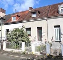 PURNHAGEN-IMMOBILIEN - Reihenmittelhaus in ruhiger Nebenstraße von Bremen-Gröpelingen! - Bremen / Gröpelingen