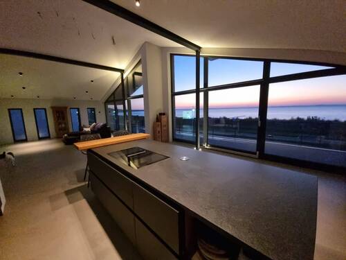 Wohnungsansicht bei Nacht - Etagenwohnung mit 185,00 m&sup2; in Glowe zum Kaufen