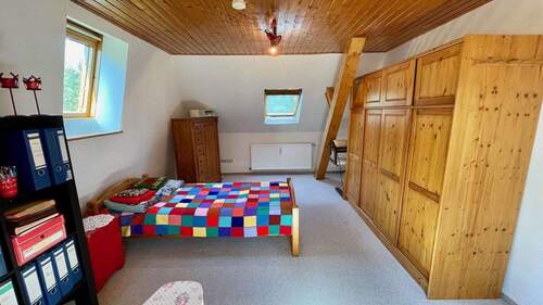 Zimmer im Dachgeschoss - 
