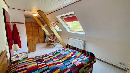 Zimmer im Dachgeschoss - 
