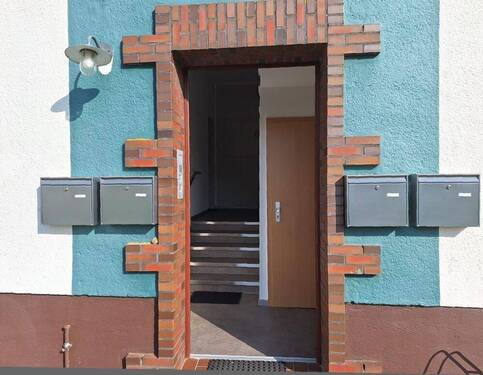 Hauseingang - Etagenwohnung mit 74,50 m² in Sande zum Kaufen