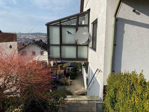 Zugang zur Einliegerwohnung mit Wintergarten zur Hauptwohnung - 