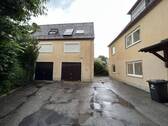 Doppelgarage mit Wohnung - 