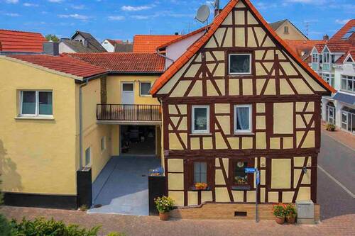 Seitenansicht - Mehrfamilienhaus mit 3 WE + 1 GE, Ausbaupotenzial in gefragter Lage Groß-Zimmern