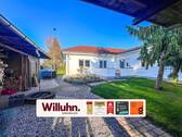 Hausansicht - Familienfreundliches Einfamilienhaus mit Gartenhaus, Wintergarten und attraktivem Grundstück