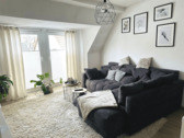 Wohnzimmer - Charmante Dachgeschosswohnung in bester Innenstadtlage von Soest!