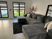 Wohnzimmer Ansicht 1 - 6 Zimmer Einfamilienhaus zum Kaufen in Oberhausen