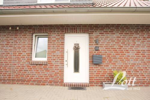Hauseingang - Doppelhaushälfte mit 115,40 m² in Bad Zwischenahn zum Kaufen