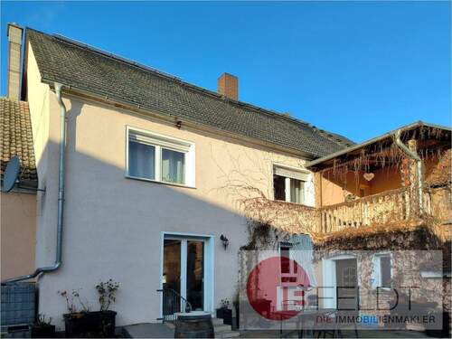 Rückansicht mit Balkon und Terrasse - Mehrfamilienhaus, Wohnhaus mit 420,00 m&sup2; in Treuenbrietzen / Pflügkuff zum Kaufen