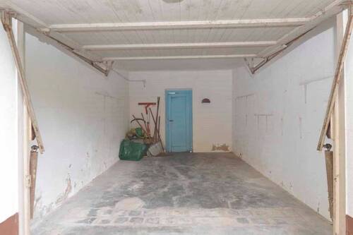 Garage mit Zugang zum Garten - 