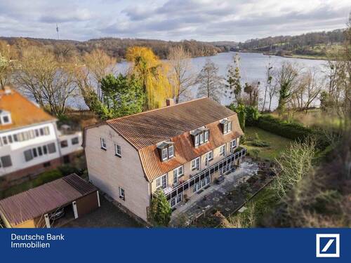 Haus rückseitig - Stilvolles Mehrfamilienhaus mit großzügigem Garten