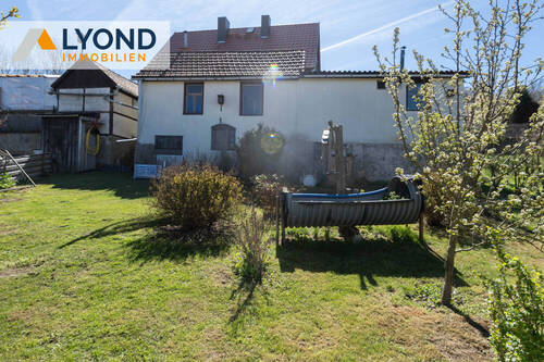 Ansicht vom Garten - Einfamilienhaus mit tollem Ausblick zu verkaufen