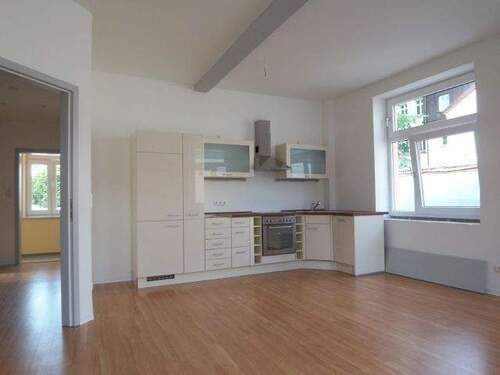 Wohneßbereich - Mitten in der Stadt, fern vom Trubel: 2-Zimmer-Hofwohnung mit Balkon