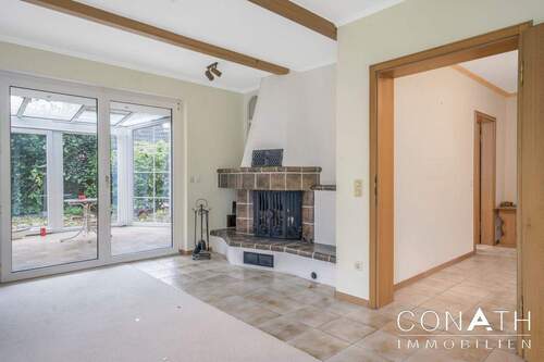 Conath-Immobilien_Harsefeld_Buxtehude_Fredenbeck -Kamin im Wohnzimmer - Mehrfamilienhaus, Wohnhaus mit 210,00 m&sup2; in Hamburg zum Kaufen