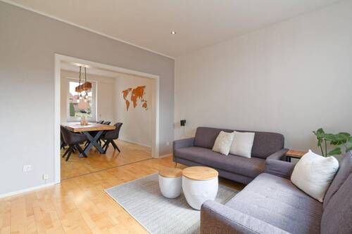 Wohnzimmer - 7 Zimmer Einfamilienhaus zum Kaufen in Oelde