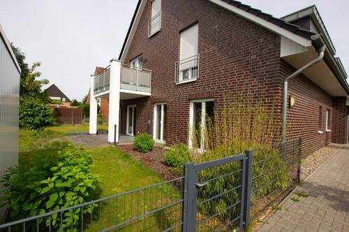 Gartenansicht - Großzügige 3-Zimmer Erdgeschosswohnung mit Garten