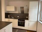 Einbauküche mit Kochinsel - 3 Zimmer Terrassenwohnung in München